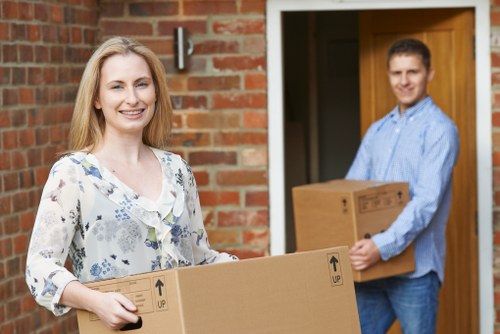 Removal team preparing a Bayswater move with boxes and furniture
