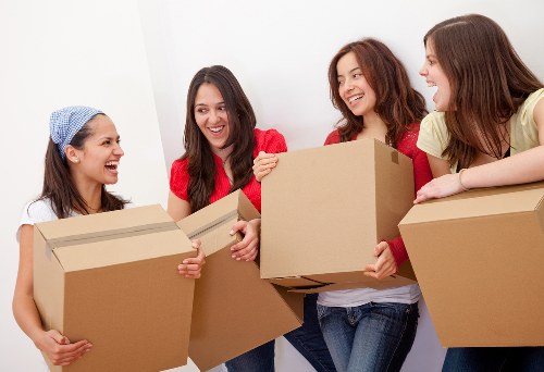 Commercial moving crew transporting office furniture in Bayswater
