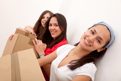 Professional movers handling furniture during a Bayswater home relocation