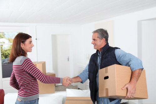 Local moving team handling boxes and furniture in Bayswater