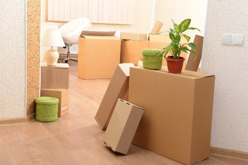 A professional moving team following safe work practices during transport