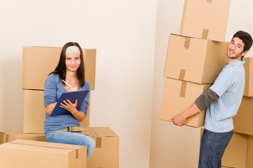 Moving truck being loaded with household furniture