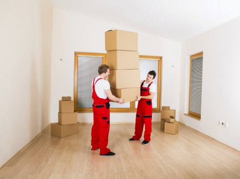 Professional team handling furniture pick-up in a Bayswater home